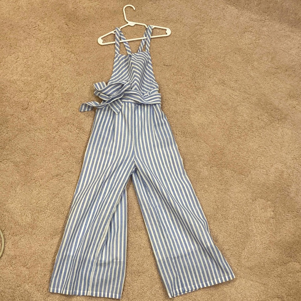 Girls size 7/8  Blue and white striped jump suit, belted lined
